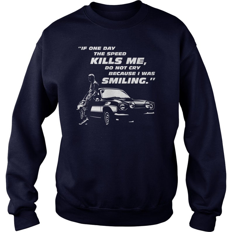May include: Navy blue sweatshirt with a white graphic print of a car and a person. The text on the graphic reads "IF ONE DAY THE SPEED KILLS ME, DO NOT CRY BECAUSE I WAS SMILING."