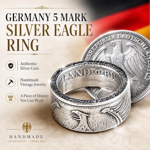 May include: A silver ring made from a German 5 Mark coin, featuring an eagle design. The ring has the text "LAND d. BU" and is shown with a coin that reads "DEUTSCHLAND". The image also includes the text "SILVER EAGLE RING".