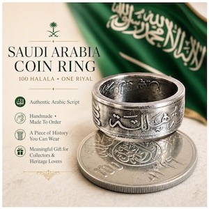 May include: A silver coin ring with Arabic script, resting on a Saudi Arabian coin. The ring is handmade and made to order. The text on the image reads "Saudi Arabia Coin Ring" and "100 Halala - One Riyal".