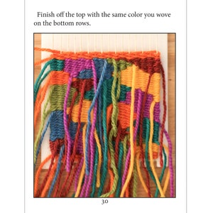 May include: A close-up of a colorful woven tapestry with fringes. The tapestry is made with different colored yarns, including red, orange, yellow, green, blue, and purple.