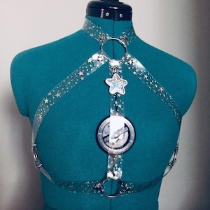 Arnés Cosmos de PVC con purpurina en forma de estrella