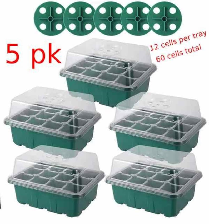 May include: Set of five green plastic seed starter trays with clear lids. Each tray has 12 cells and a total of 60 cells. The text on the image reads "5 pk", "12 cells per tray", and "60 cells total".