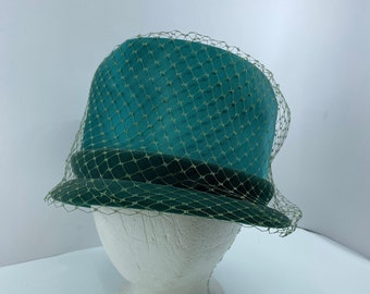Late 1950s or Early 60s Green satin and velvet ladies bucket hat, womens hat size 7 1/8 with veiling, vintage hat