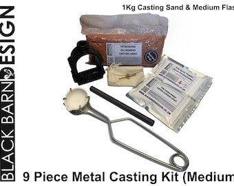 May include: A 9-piece metal casting kit, including 1Kg of casting sand, a medium flask, and other tools. The kit includes a crucible, tongs, and fluxing powder. The text "9 Piece Metal Casting Kit (Medium)" is visible.
