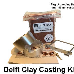 May include: A Delft Clay Casting Kit, featuring a bag of 2kg of genuine Delft Clay, a 100mm casting ring, and other tools. The kit includes a metal casting ring, a saw frame, and a small brass tool. The text "Delft Clay" is visible.