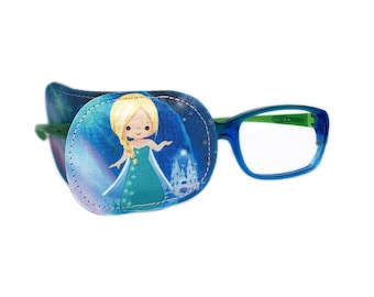 May include: A blue and green eye patch with a cartoon image of a princess in a blue and green dress. The eye patch is attached to a pair of blue framed glasses with green arms.