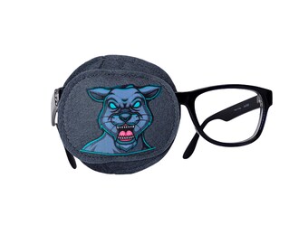 May include: A black eye patch with a blue and green cartoon animal face on it. The eye patch is attached to a pair of black framed glasses.