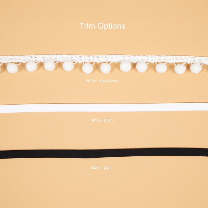 May include: Three trim options for a garment: white trim with pom poms, white plain trim, and black plain trim.