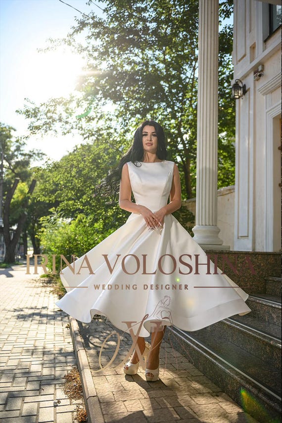 knee length dresses for ladies Simple Elegant Tea Length Wedding Dress with Shimmery Top Size 28W / Ivory