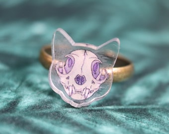 Ring with acrylic cat skull charm