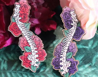 Spine with Roses – Dinosaur Pins & Magnets