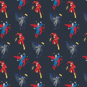 May include: Dark blue fabric featuring a repeating pattern of comic book superheroes. The design includes Superman in blue and red, The Flash in red and yellow, and Batman in gray and black. The background is a solid dark blue.