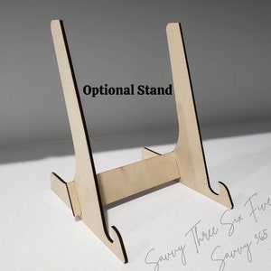 May include: A wooden stand for displaying items, with the text "Optional Stand" printed on the front.