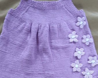 Lilac pinafore dress with knitted flower detail