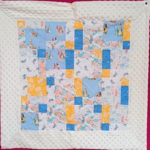 May include: A white ceramic mug with a black handle and the text "But First, Coffee" in a black, bold font. The mug is on a white surface.