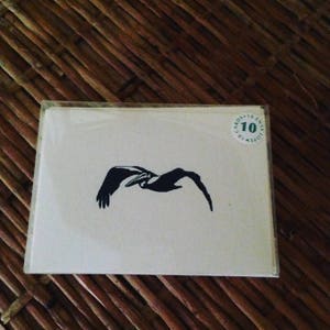 Scheda di nota di Lone Pelican