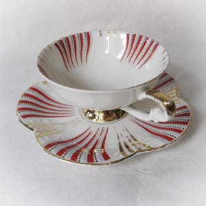 Johann Seltmann, Vohenstrauß Bavaria 22 kt. gold Porzellan Teetasse und Untertasse Set. Handgemaltes goldenes Dekor. Vintage deutsche Ware.
