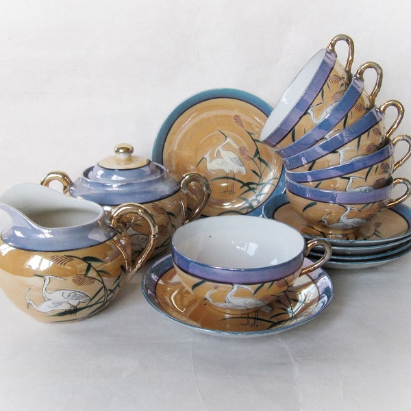 Servizio da tè in porcellana Dai Nippon, design White Herons. Porcellana color guscio d'uovo color pesca e blu brillante. Fatto in Giappone. Lustri giapponesi vintage.