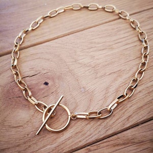 Large gold chain necklace with toggle clasp