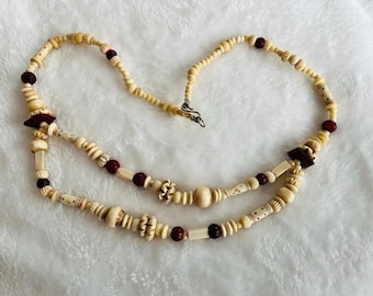 Carved bone and horn bead necklace