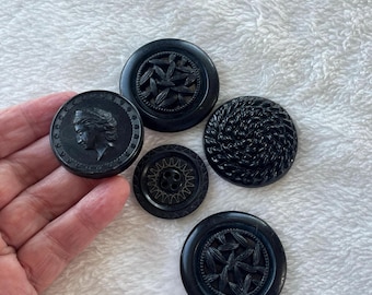 Black celluloid picture buttons