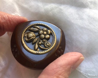 Bakelite and brass flower button