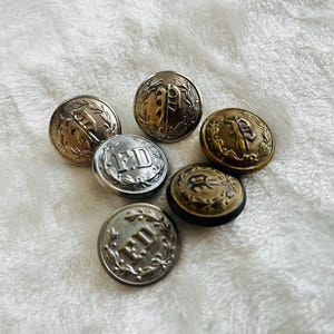 Old uniform buttons police and fire department