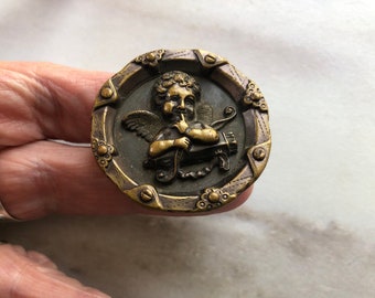 Victorian brass picture button cupid thinking