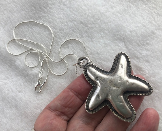 Silver starfish pendant necklace of pewter - image 1