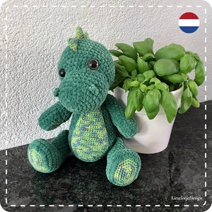 Peluche Drommel con motivo all'uncinetto