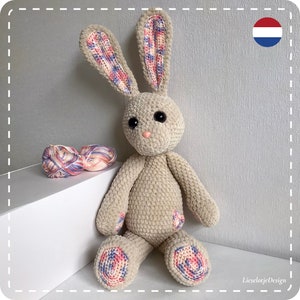 Peluche Bunny Happy con motivo all'uncinetto