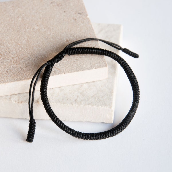 Black buddhist  protection, string bracelet - Handmade adjustable protection amulet.
