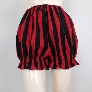 May include: Red and black striped bloomers with a ruffled hem.