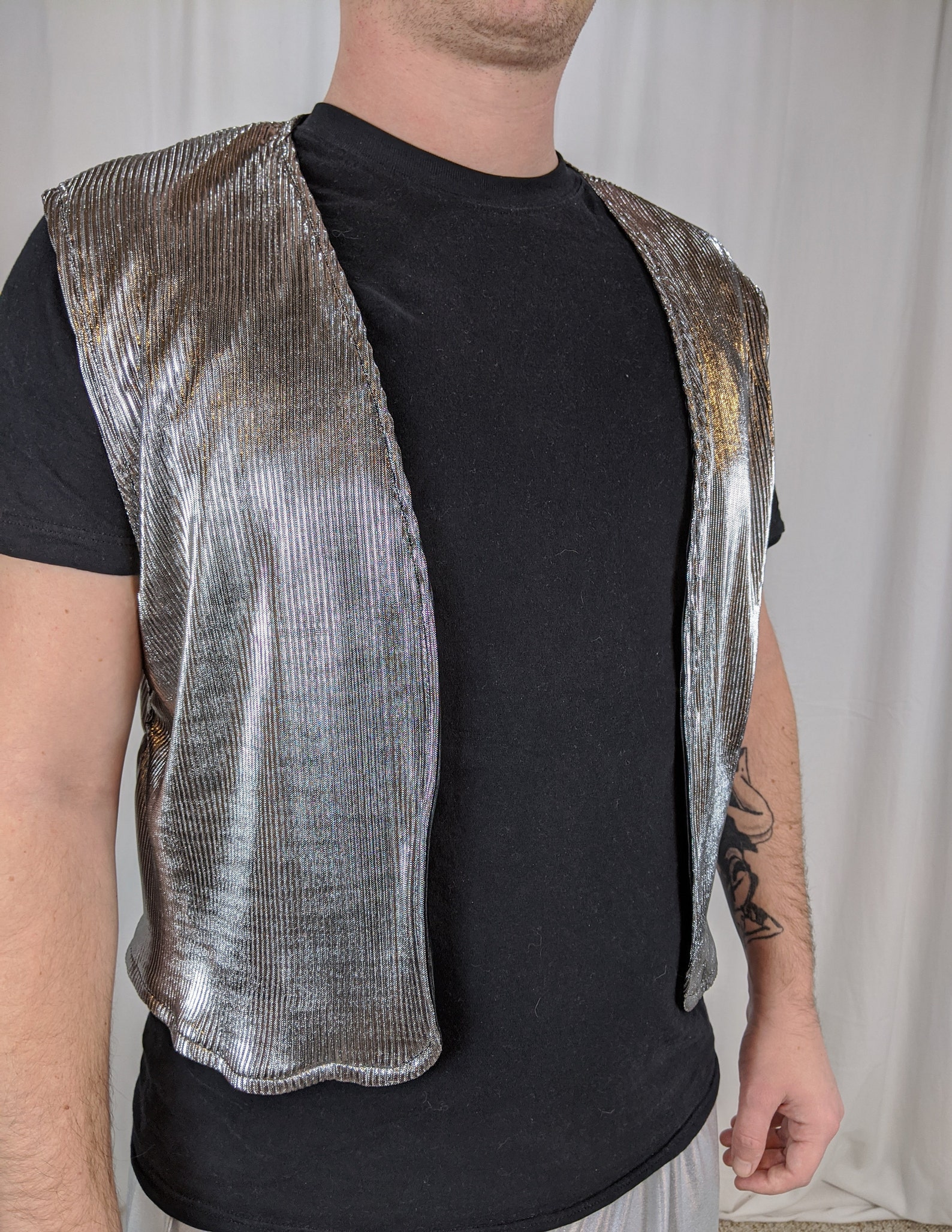mardi gras puffer vest metallic