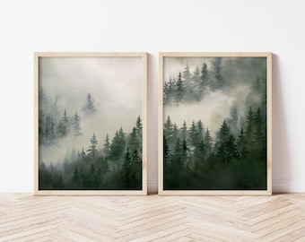 May include: Two framed watercolor paintings of a misty forest scene with dark green trees. The paintings are in a minimalist style and feature a soft, muted color palette.