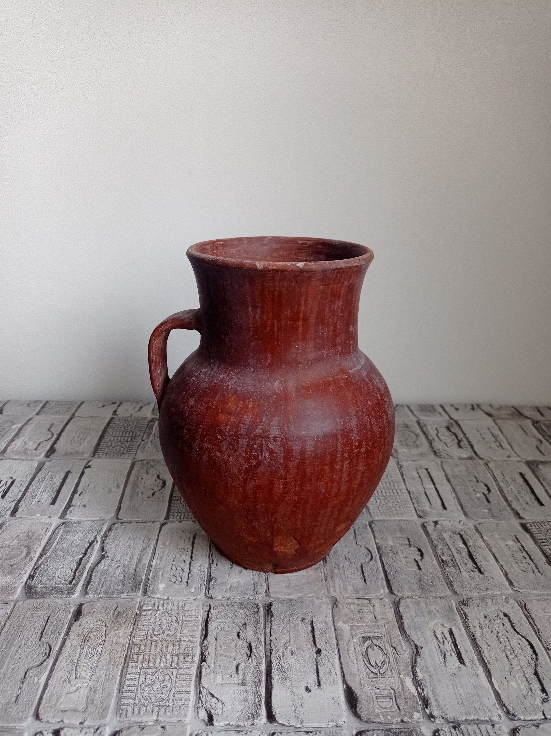 Jarrón de cerámica con patrón rústico antiguo vasija de barro antigua