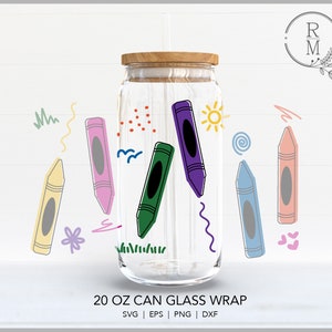 May include: A 20 ounce glass jar with a wooden lid, decorated with colorful crayon drawings and doodles. The jar is designed to be used as a wrap for a can.
