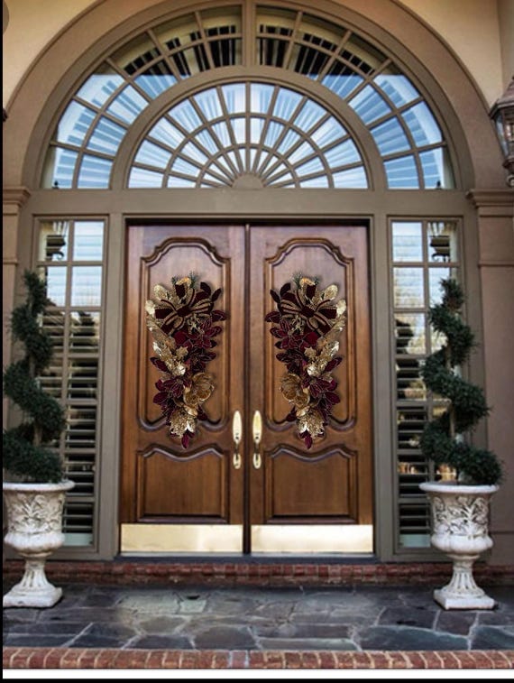 Burgundy velvet gold poinsettias magnolia Christmas designer teardrop swag for double front door