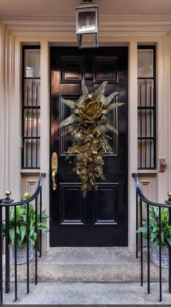 Gold platinum flocked Christmas double door elegant luxury wreath swag magnolia poinsettia for front door