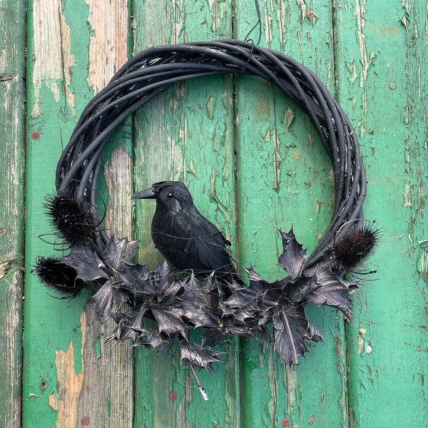 Halloween door wreath with crow . Black dry plant wall decor