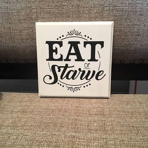 Eat or Starve Wood Sign