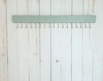 Hazy gray jewelry hanger