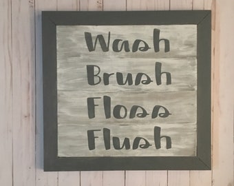 Cartel de madera del baño