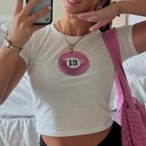13 ball coquette baby tee! Coquette baby tee, downtown girl baby tee, coquette room decor, downtown girl clothes, downtown girl aesthetic