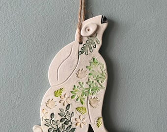 Handmade 2-d ceramic moon gazing hare decoration (leaves)