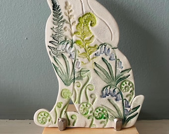 Handmade 2-d ceramic moon gazing hare decoration ( bluebells and ferns) on a stand