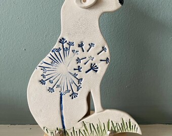 Handmade 2-d ceramic cunning fox  decoration (large dandelion with flying dandelion seeds) on a stand