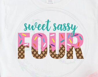 May include: A white t-shirt with a pink and brown ice cream cone design that says "sweet sassy four" with colorful sprinkles. The shirt is on a white surface with a pink tutu and pink and white sneakers.