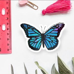 May include: A blue and purple butterfly sticker with the text "there is a time for everything." The sticker is on a white background.