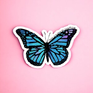May include: A blue and purple butterfly sticker with the text "There is a time for everything".